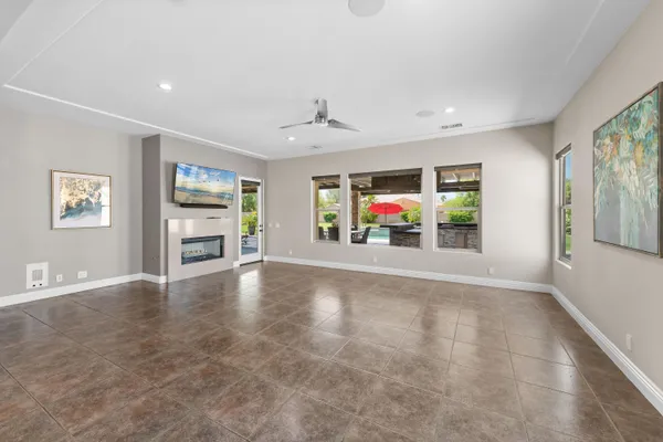a view of a workspace with furniture and a cabinet