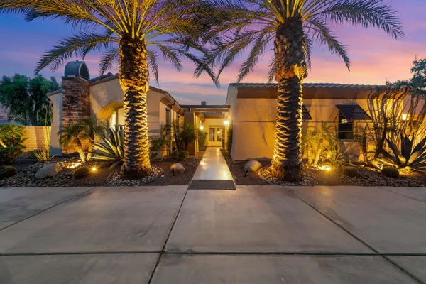 a view of a street with a building in the background