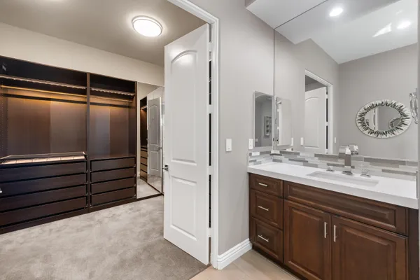 a view of a swimming pool with a lounge chair