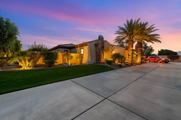 front view of a house with a patio