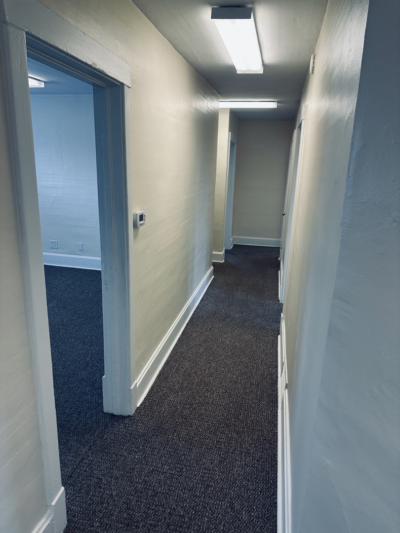 445 North Main Street, Unit 2 Sycamore, IL 60178 - Photo 4 of 11 an empty room with closet