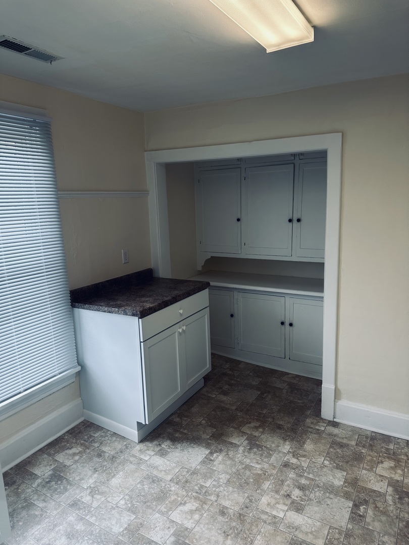445 North Main Street, Unit 2 Sycamore, IL 60178 - Photo 8 of 11 a kitchen with a stove and a refrigerator