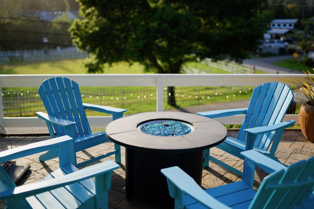 145 Rabbits Run Road Santa Cruz, CA 95060 - Photo 104 of 120 a view of a dining room with furniture and a floor to ceiling window