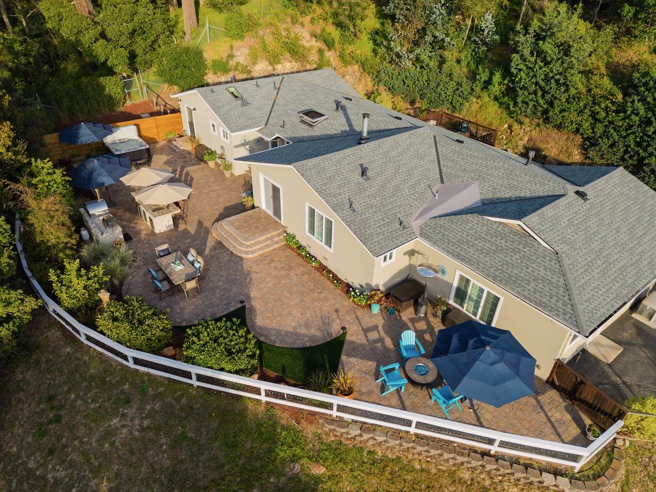 145 Rabbits Run Road Santa Cruz, CA 95060 - Photo 118 of 120 an aerial view of a house with a yard and large tree