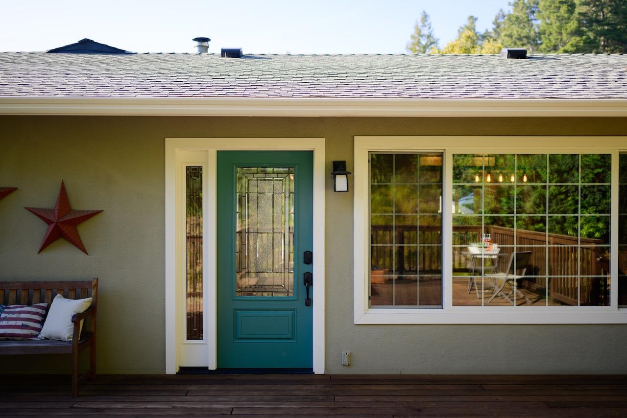 145 Rabbits Run Road Santa Cruz, CA 95060 - Photo 14 of 120 a front view of a house with a yard