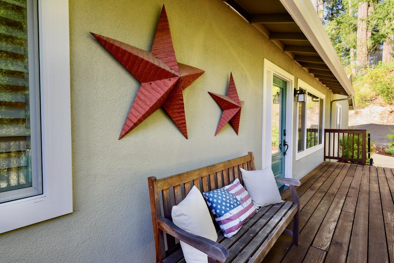 145 Rabbits Run Road Santa Cruz, CA 95060 - Photo 15 of 120 a view of balcony with wooden floor and outdoor seating