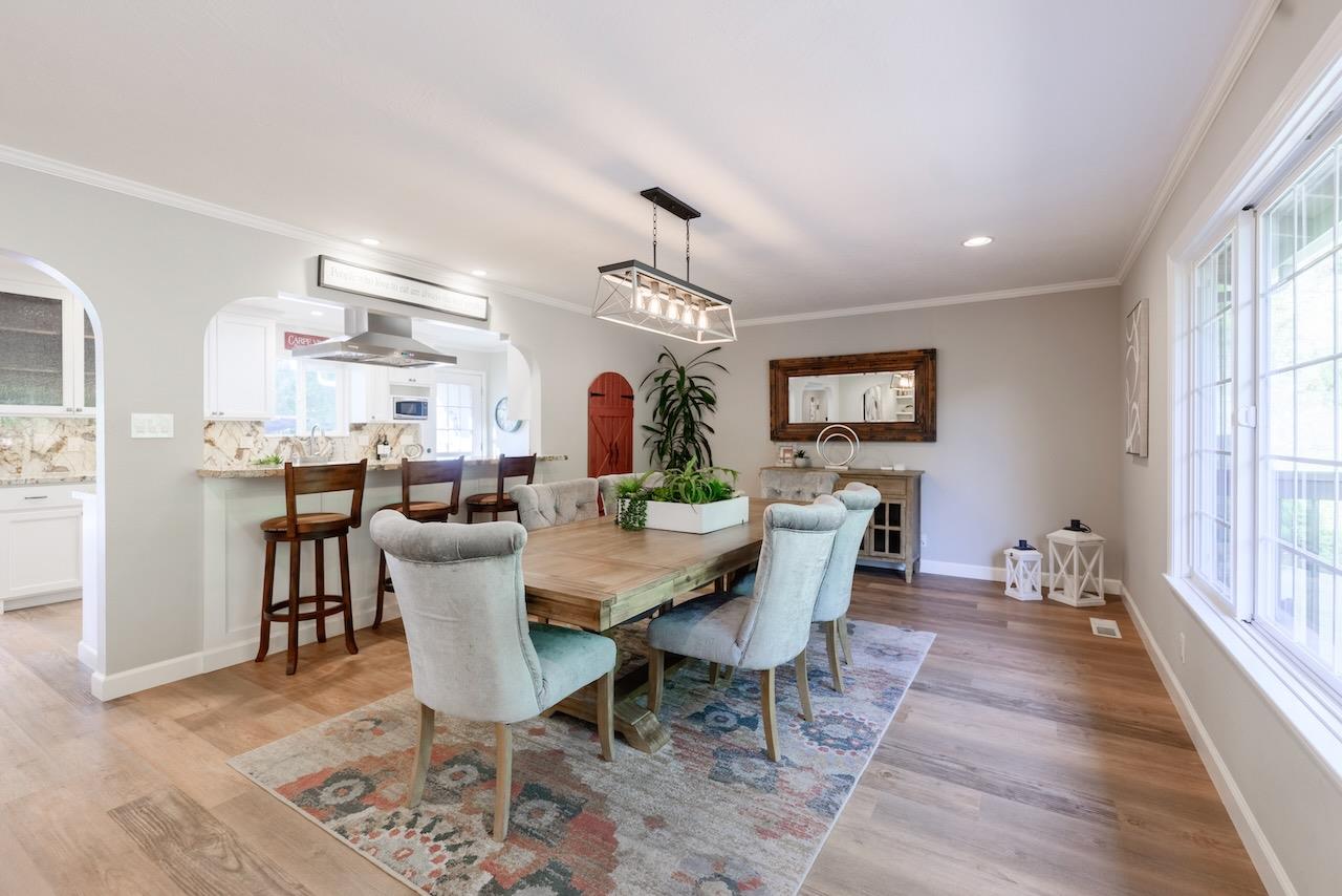 145 Rabbits Run Road Santa Cruz, CA 95060 - Photo 23 of 120 a view of a dining room with furniture window and wooden floor