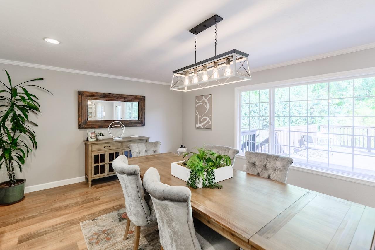 145 Rabbits Run Road Santa Cruz, CA 95060 - Photo 26 of 120 a view of a dining room with furniture window and wooden floor