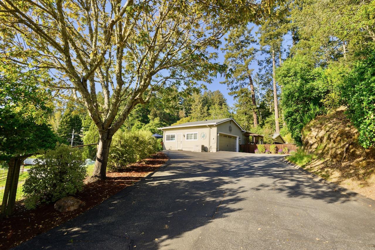 145 Rabbits Run Road Santa Cruz, CA 95060 - Photo 5 of 120 front view of a house with a trees