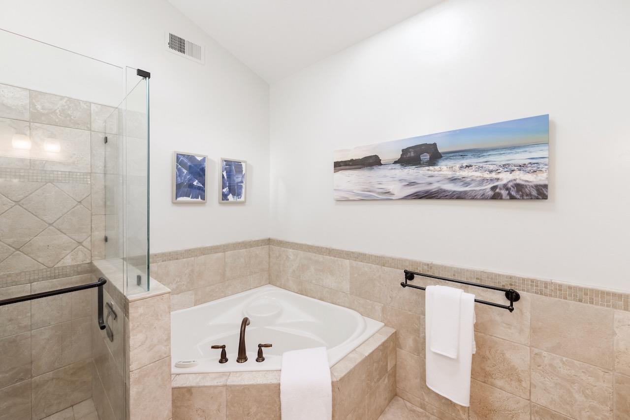 145 Rabbits Run Road Santa Cruz, CA 95060 - Photo 57 of 120 a bathroom with a tub and a shower