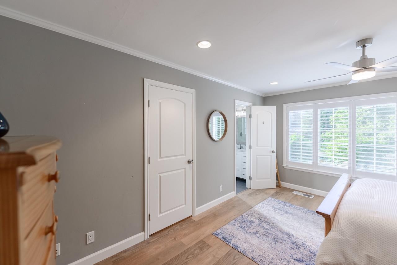 145 Rabbits Run Road Santa Cruz, CA 95060 - Photo 70 of 120 a spacious bedroom with a bed and a large window