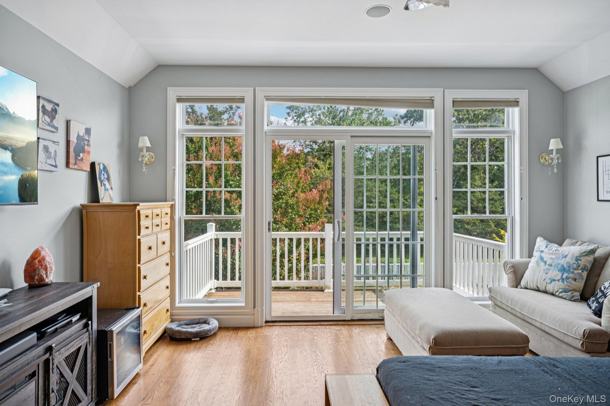 12 Laila Lane Remsenburg, NY 11960 - Photo 30 of 50 a living room with furniture tv and a window