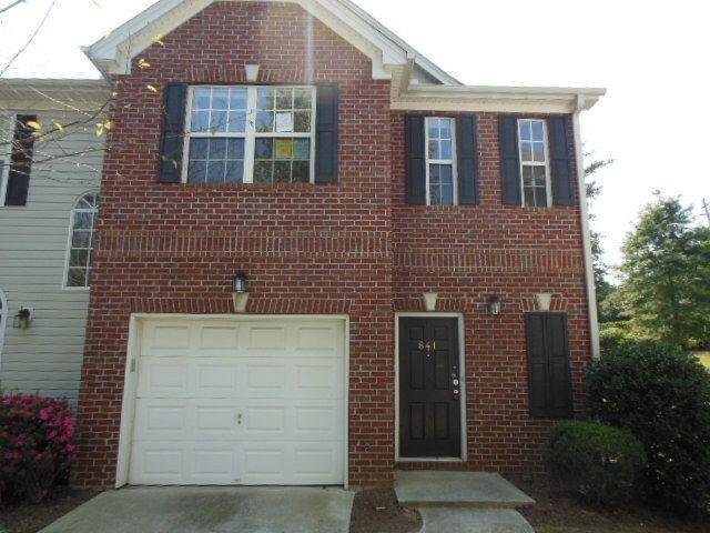 841 Rozie Way Southwest Atlanta, GA 30331 - Photo 1 of 1 a front view of a house