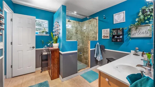 a living room with furniture and a dining table