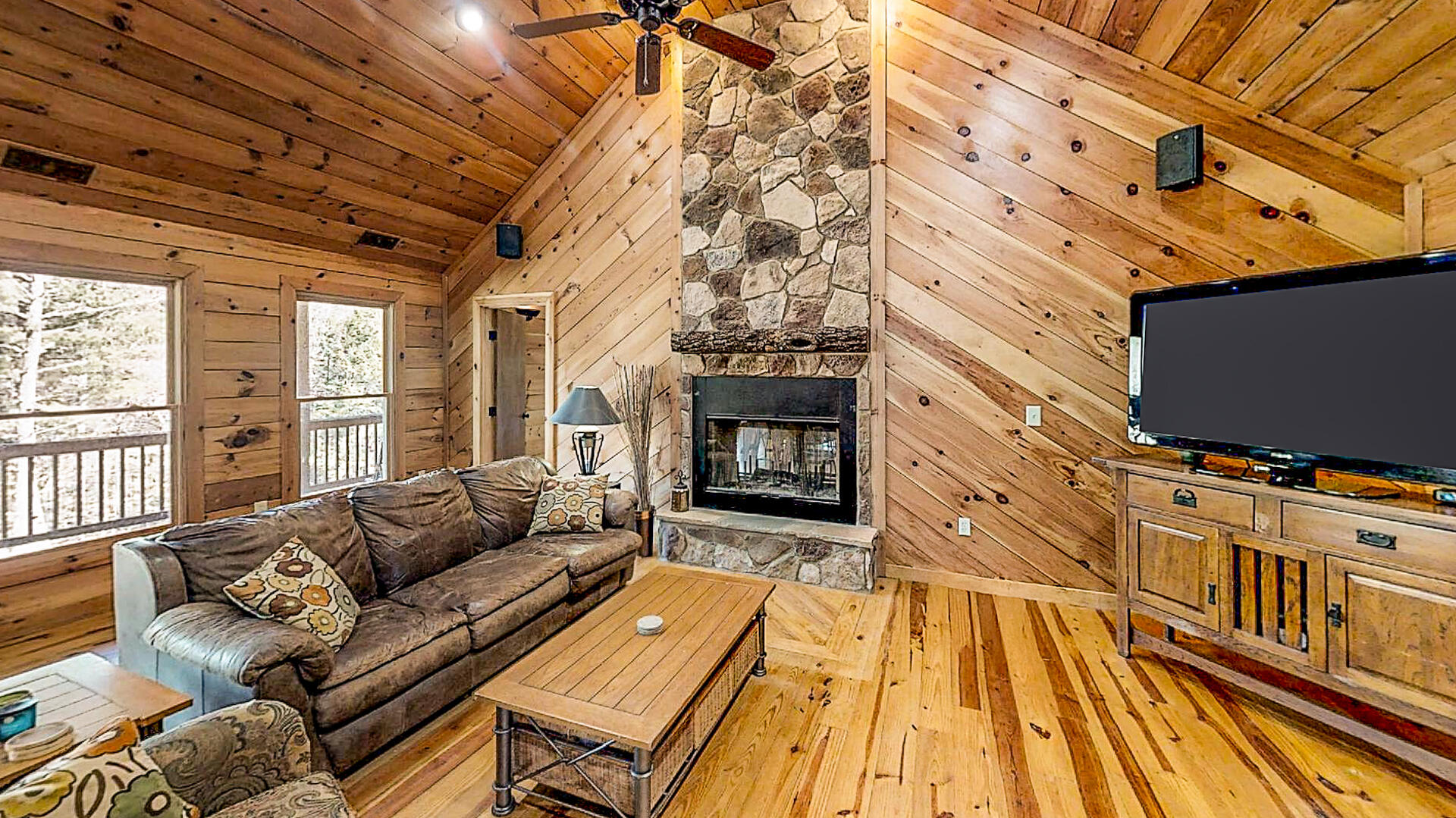 57 Hemlock Ridge Lane Catawba, VA 24070 - Photo 51 of 89 a living room with furniture a flat screen tv and a fireplace