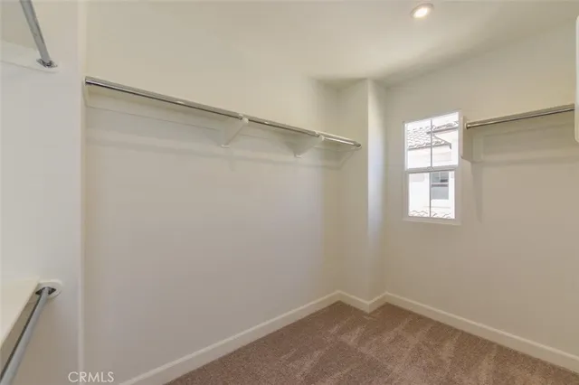 a view of a room with rack on the wall