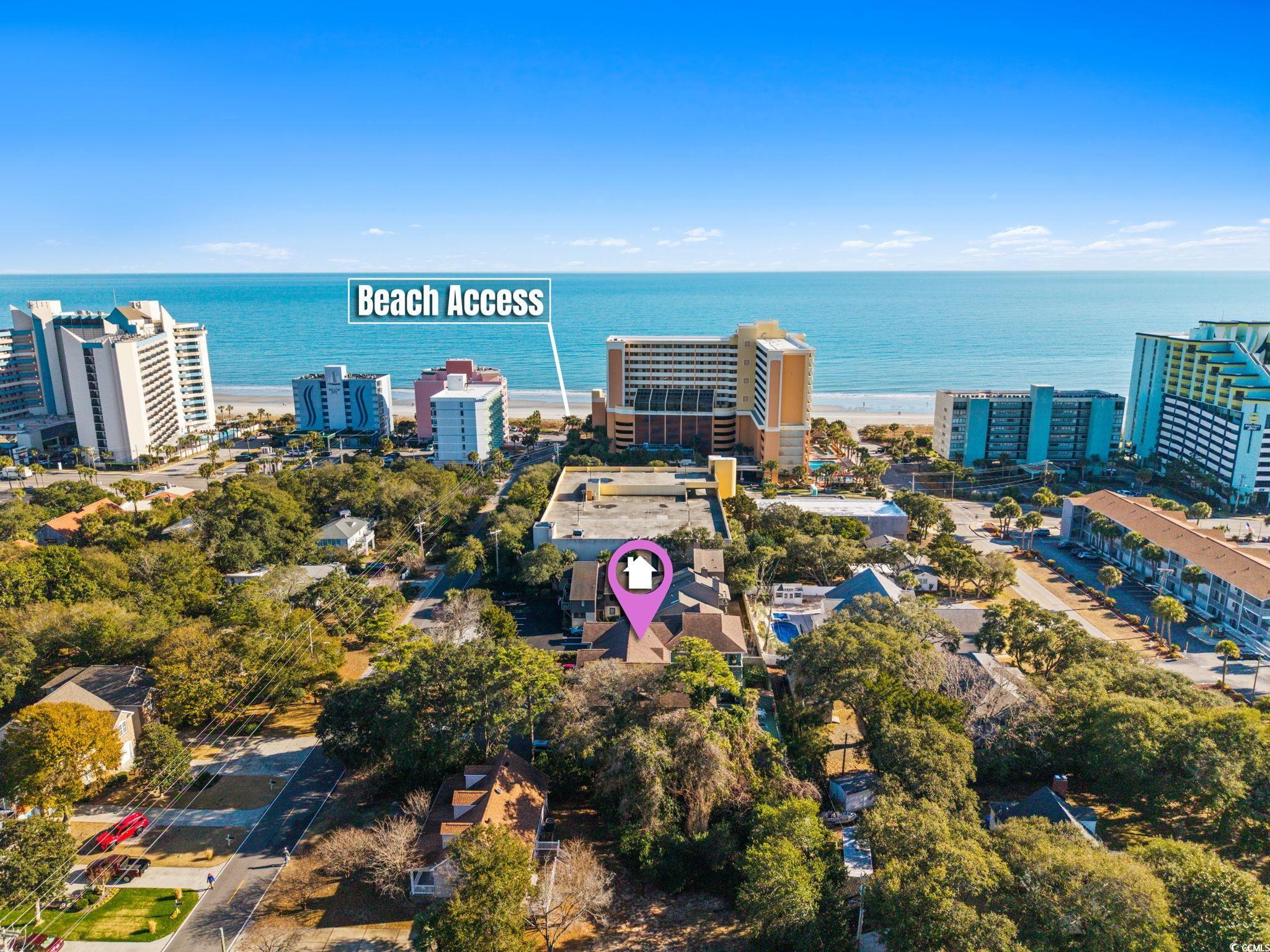 307 70th Avenue North, Unit 202 Myrtle Beach, SC 29572 - Photo 2 of 33 View of urban area featuring a large body of water