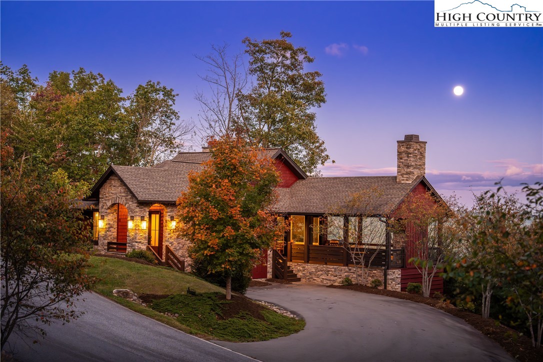 1253 Goldenrod Road Boone, NC 28607 - Photo 27 of 48 a front view of a house with a yard and garage