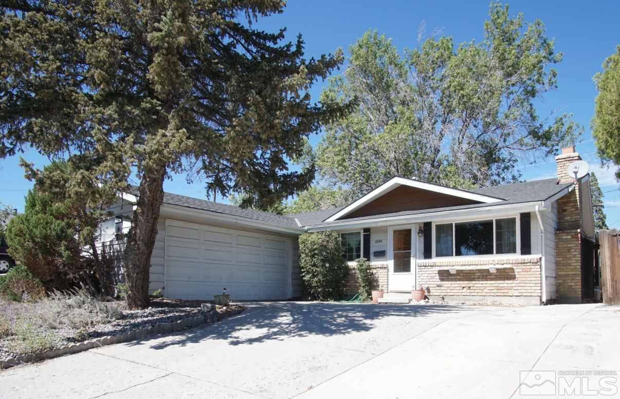 2245 West 6th Street Reno, NV 89503 - Photo 1 of 24 a front view of a house with a garden