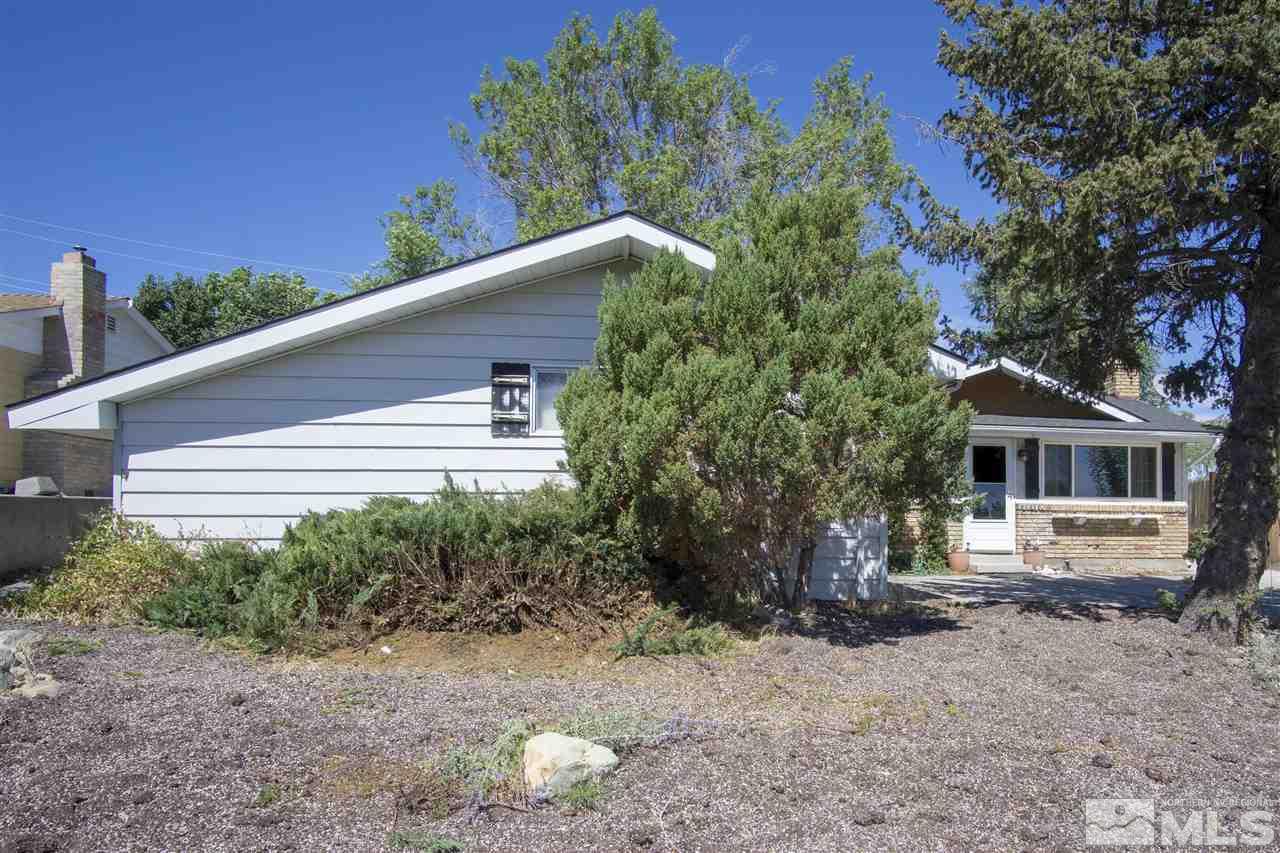 2245 West 6th Street Reno, NV 89503 - Photo 15 of 24 a backyard of a house with lots of green space