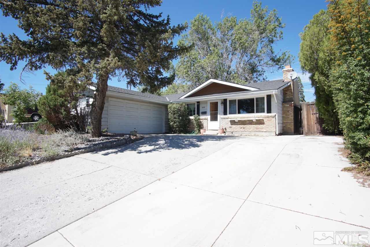 2245 West 6th Street Reno, NV 89503 - Photo 2 of 24 a front view of a house with a yard