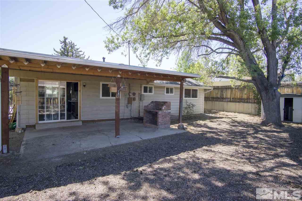 2245 West 6th Street Reno, NV 89503 - Photo 23 of 24 a view of a house with a yard and large tree