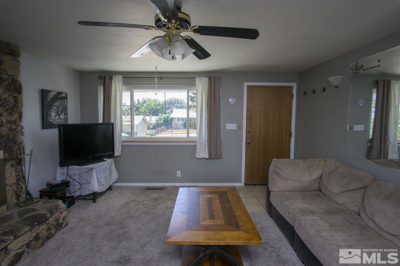 2245 West 6th Street Reno, NV 89503 - Photo 4 of 24 a living room with furniture and a flat screen tv