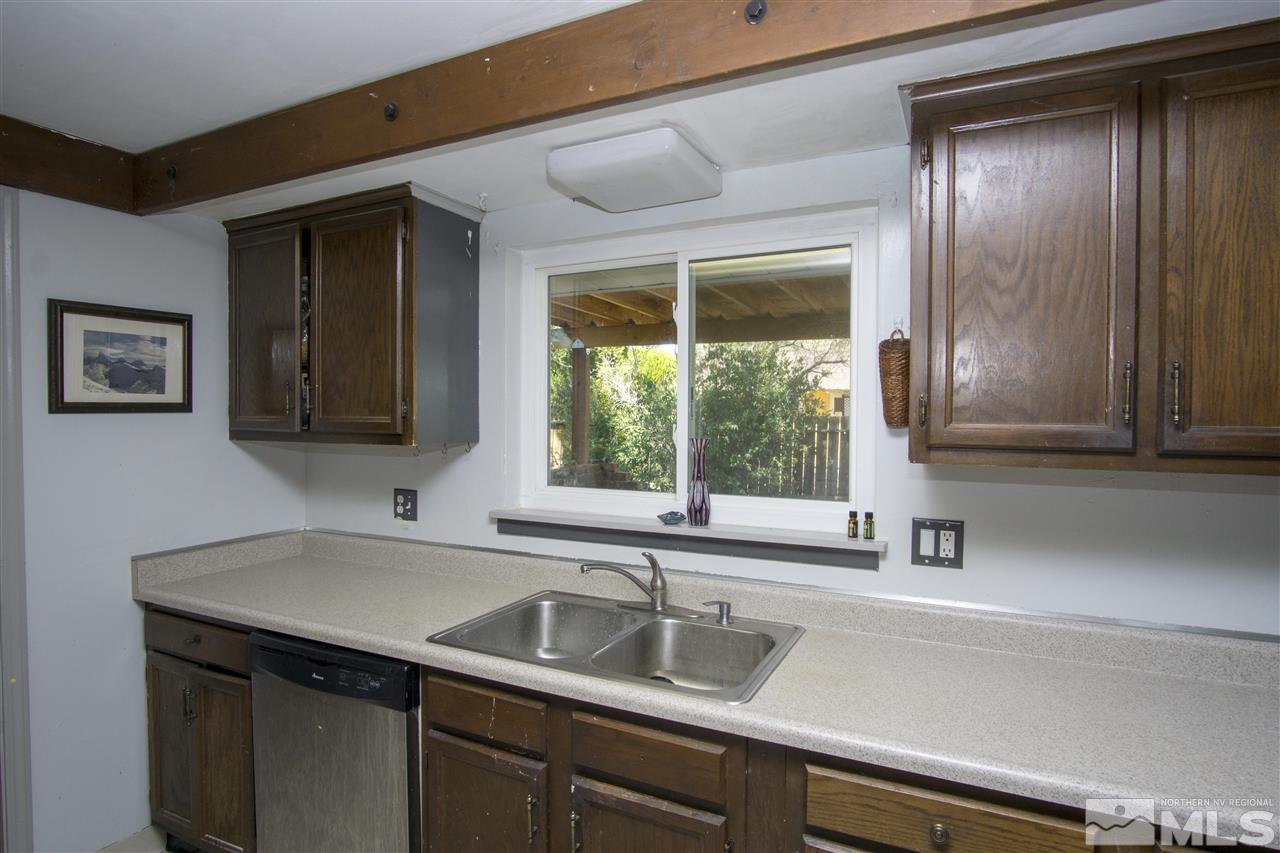 2245 West 6th Street Reno, NV 89503 - Photo 8 of 24 a kitchen with a sink and large window