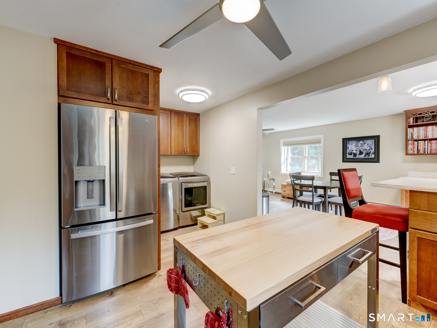 97 Lair Road New Hartford, CT 06057 - Photo 17 of 39 a kitchen with kitchen island a refrigerator stove and microwave