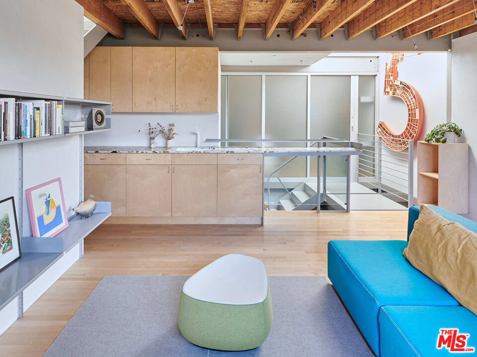 528 Grand Boulevard Venice, CA 90291 - Photo 11 of 17 a living room with furniture and a wooden floor