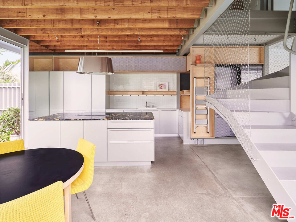 528 Grand Boulevard Venice, CA 90291 - Photo 4 of 17 a kitchen with a sink a stove and cabinets