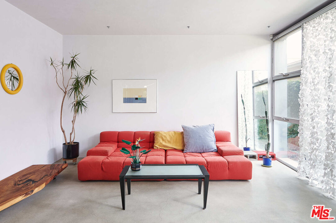 528 Grand Boulevard Venice, CA 90291 - Photo 5 of 17 a bedroom with furniture and a large window