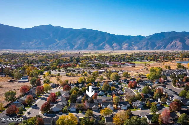 a view of a city with mountains in the background