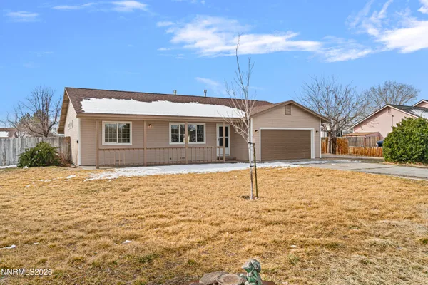 a house with yard in front of it