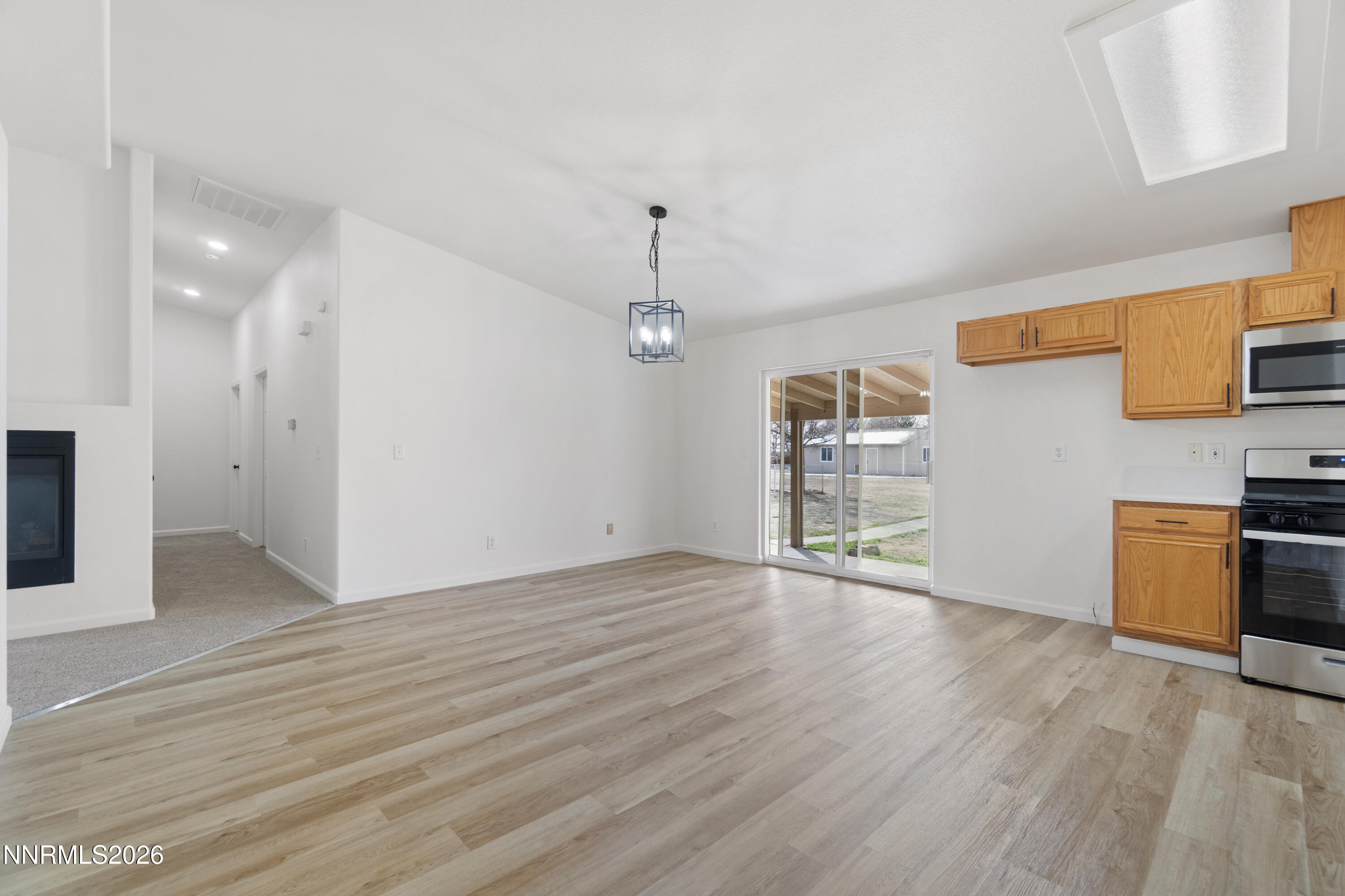 4015 Raven Drive Fallon, NV 89406 - Photo 12 of 29 a view of a kitchen with wooden floor and a sink