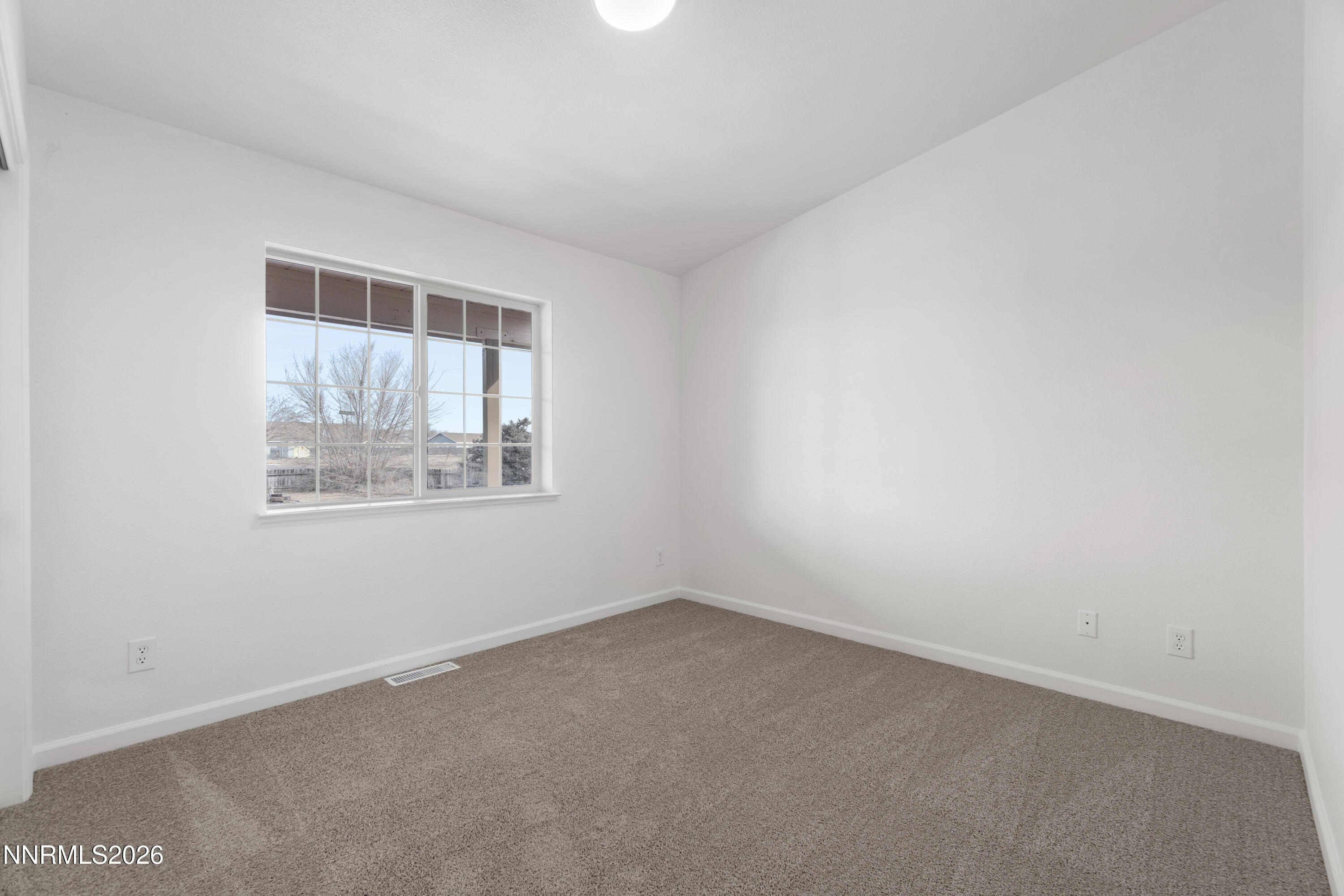 4015 Raven Drive Fallon, NV 89406 - Photo 15 of 29 an empty room with a window