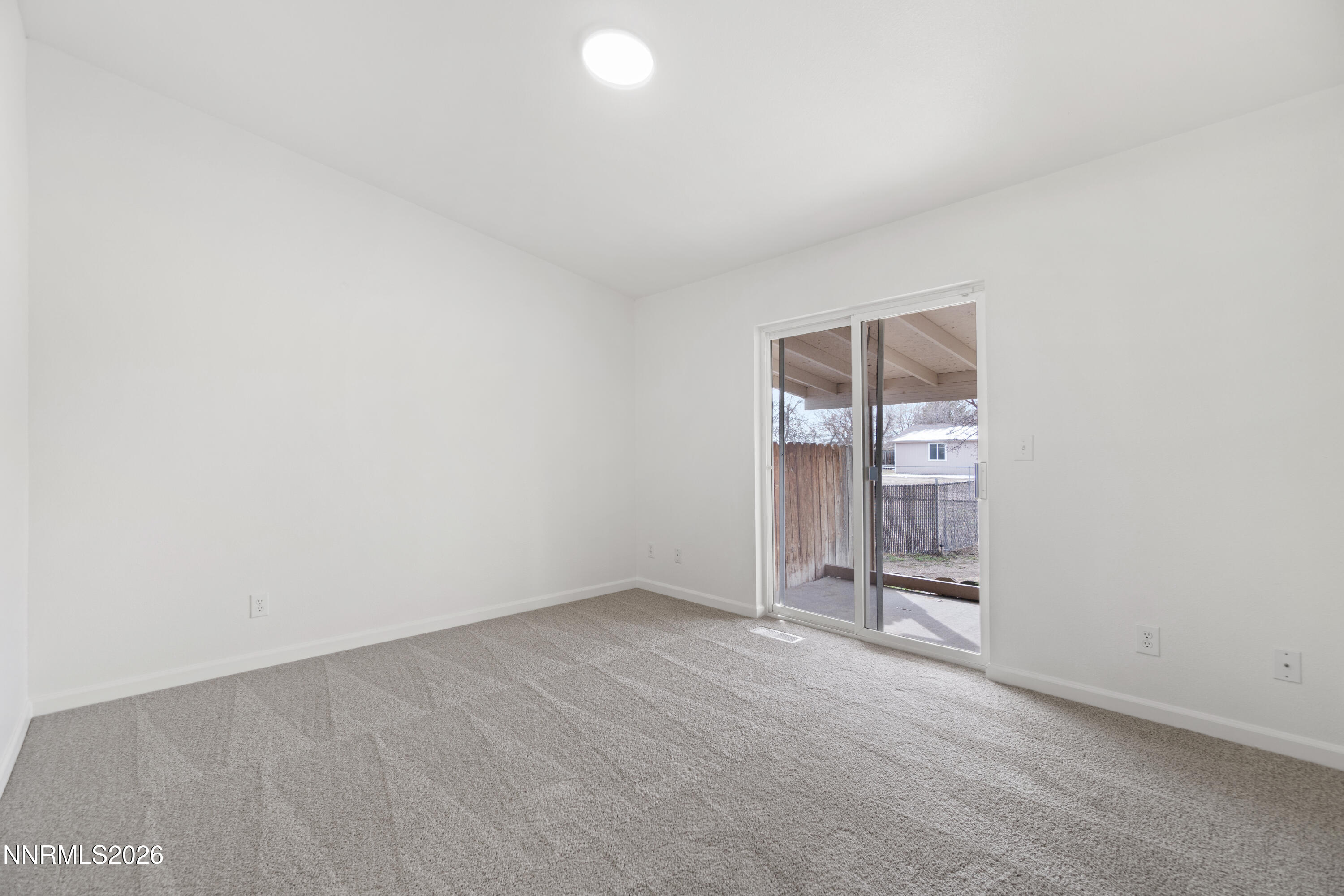4015 Raven Drive Fallon, NV 89406 - Photo 17 of 29 an empty room with closet and mirrors