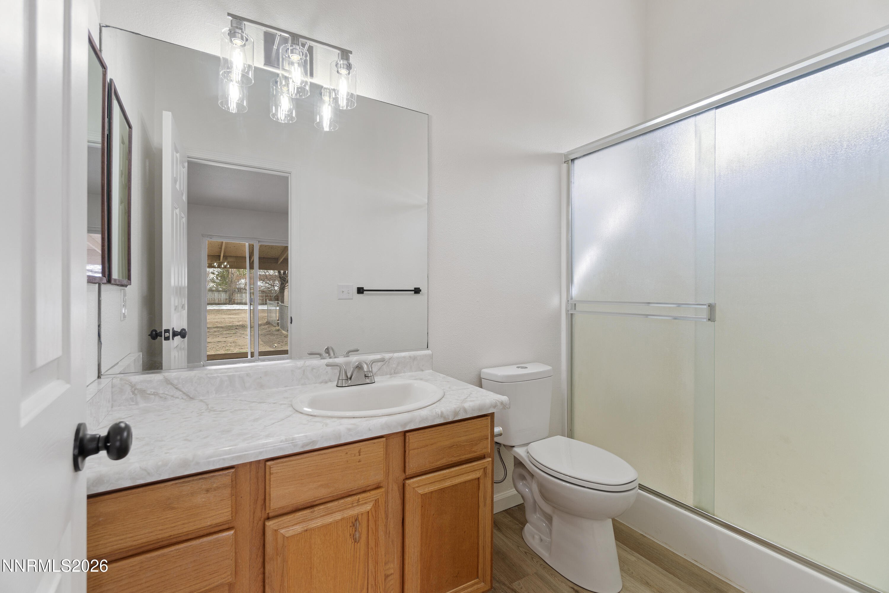 4015 Raven Drive Fallon, NV 89406 - Photo 21 of 29 a bathroom with a sink a toilet and shower