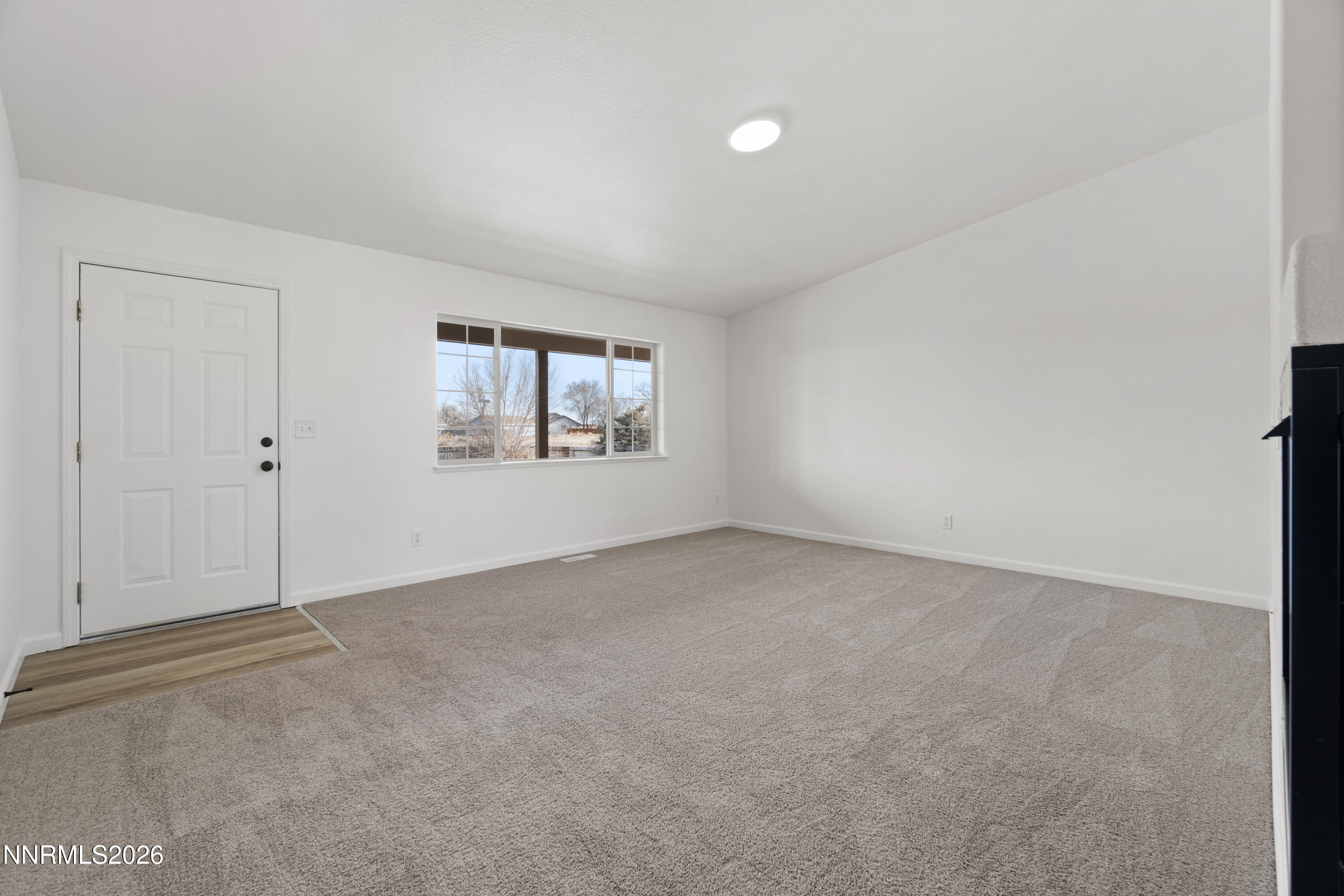 4015 Raven Drive Fallon, NV 89406 - Photo 8 of 29 an empty room with windows