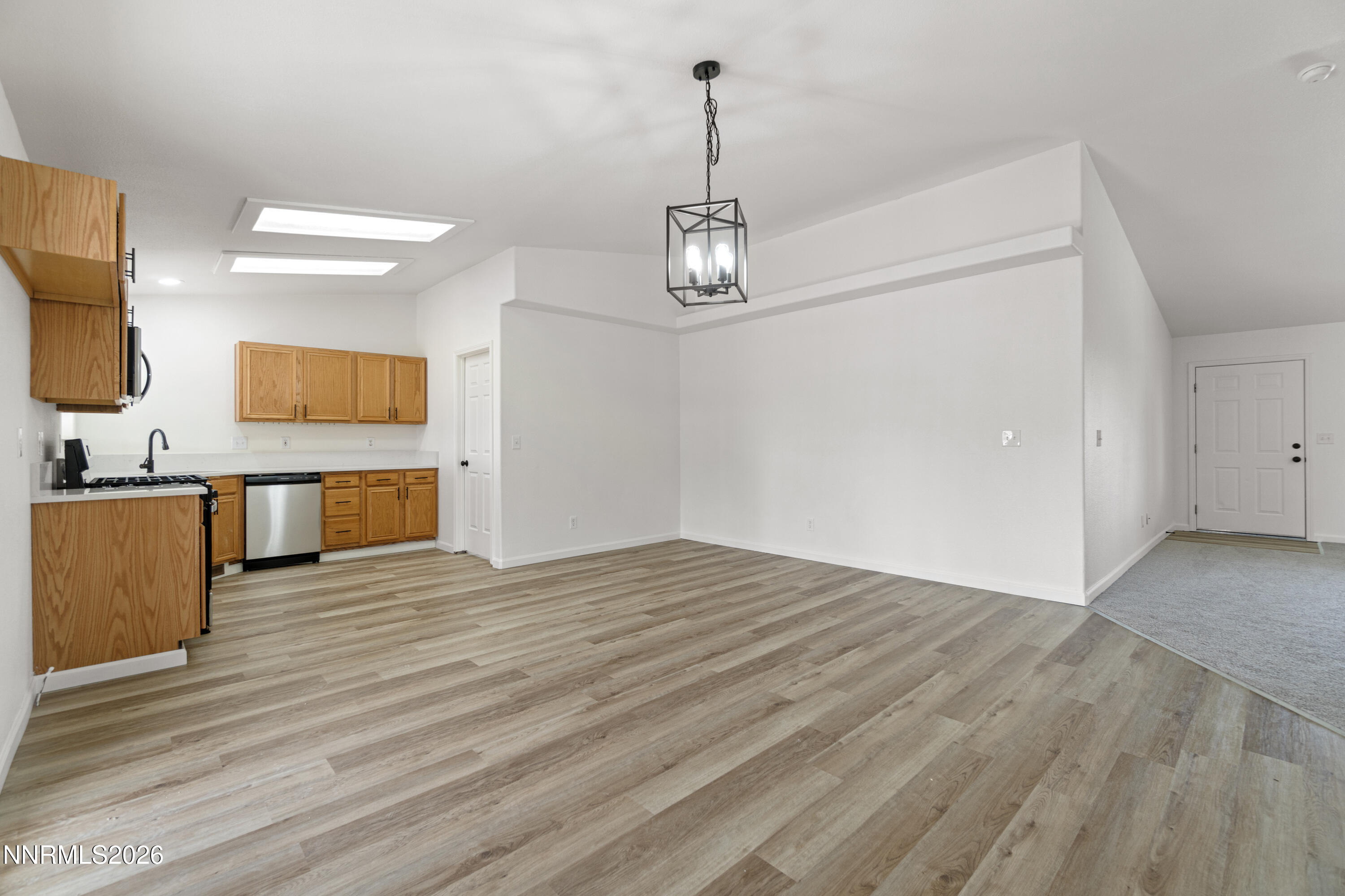 4015 Raven Drive Fallon, NV 89406 - Photo 10 of 29 a view of a kitchen with wooden floor and a sink