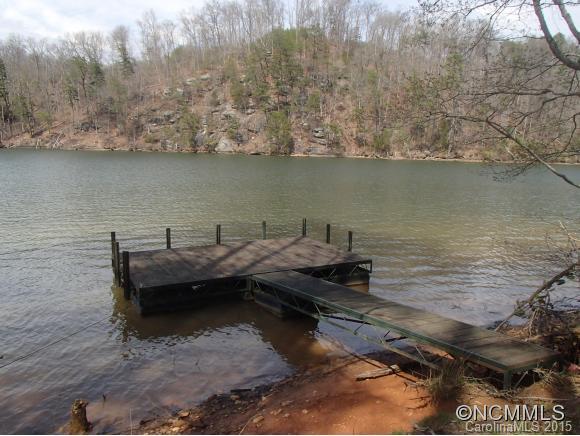 3 Hawk Ridge Drive Mill Spring, NC 28756 - Photo 5 of 6 a view of a lake with houses