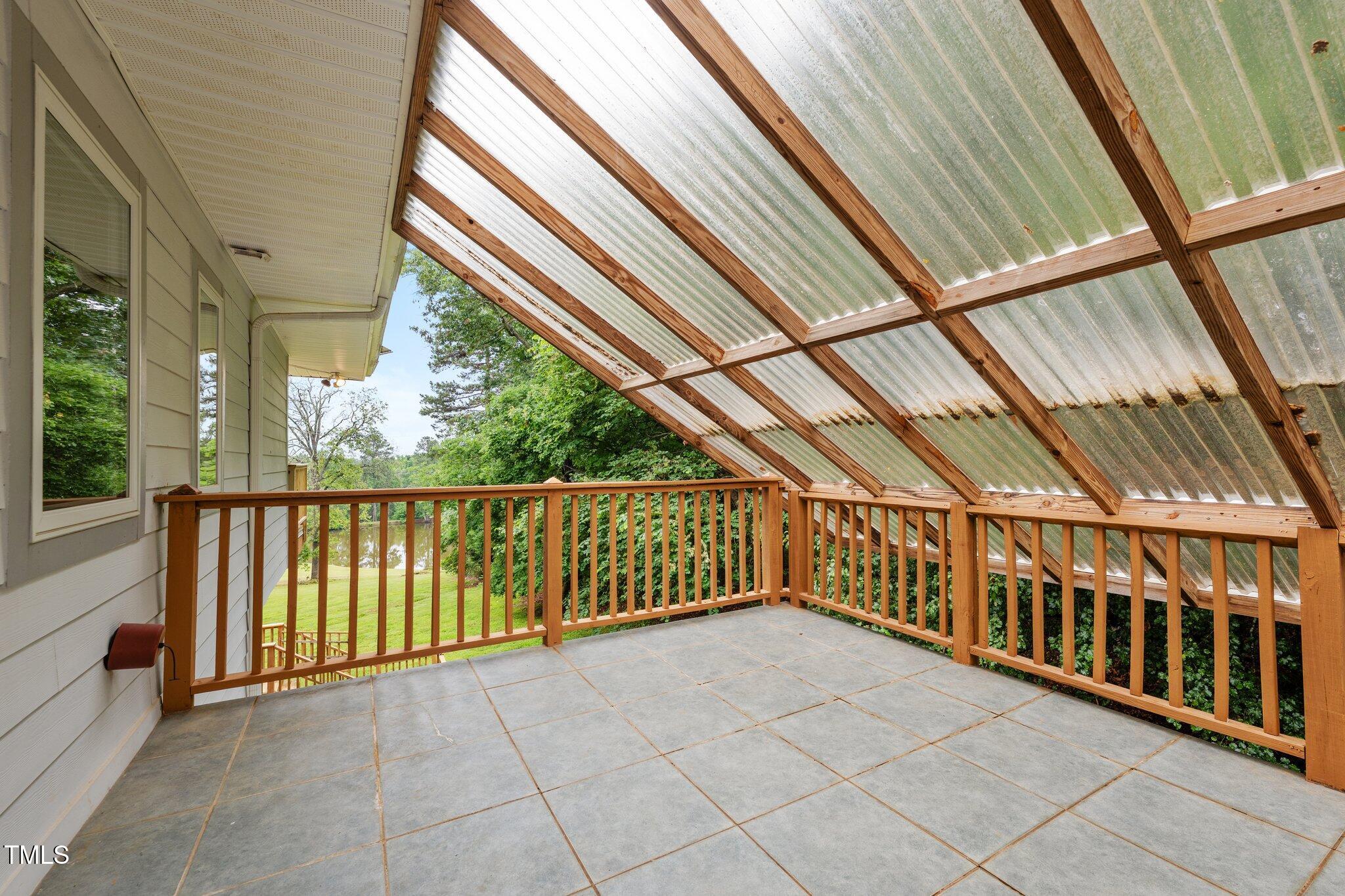 7918 Dairy Ridge Road Mebane, NC 27302 - Photo 27 of 49 COVERED PORCH OFF OF 4TH BEDROOM