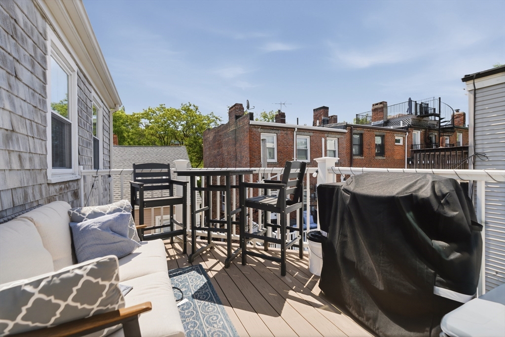 33 Mystic Street, Unit 3 Boston, MA 02129 - Photo 11 of 21 a view of a chairs and table in the balcony