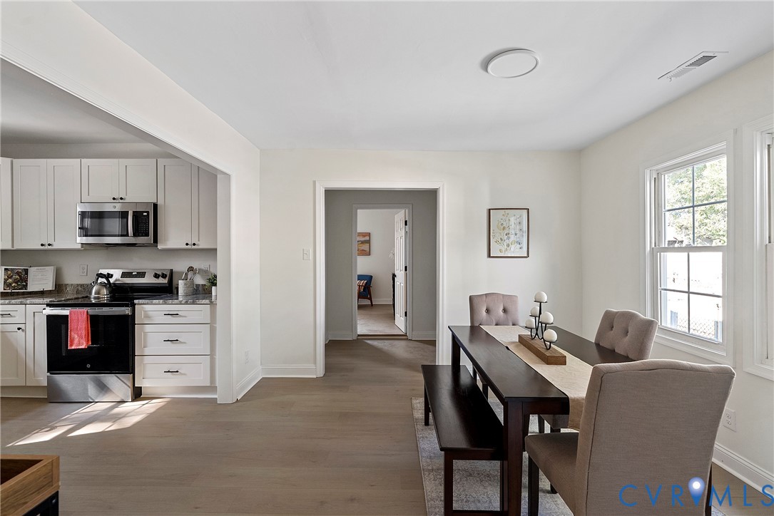 3601 Decatur Street Richmond, VA 23224 - Photo 13 of 35 Dining area with light wood-style flooring and bas