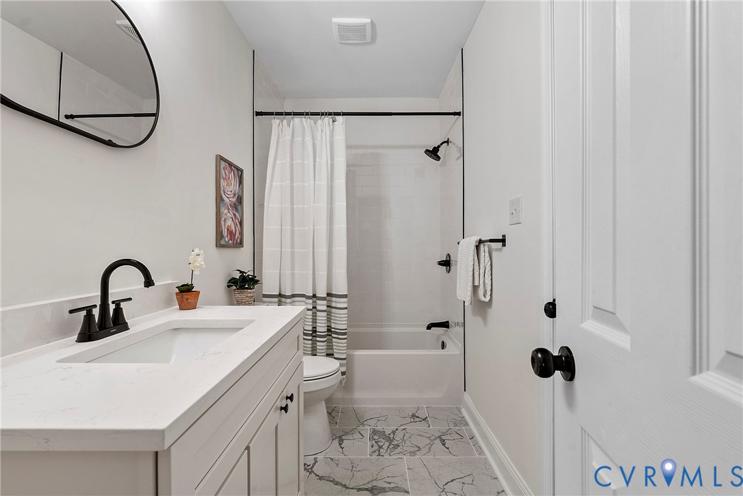 3601 Decatur Street Richmond, VA 23224 - Photo 24 of 35 Full bath featuring shower / tub combo, vanity, an