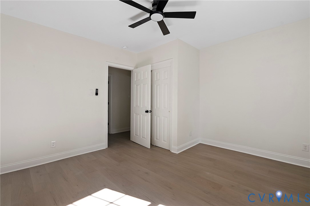 3601 Decatur Street Richmond, VA 23224 - Photo 29 of 35 Unfurnished bedroom featuring wood finished floors