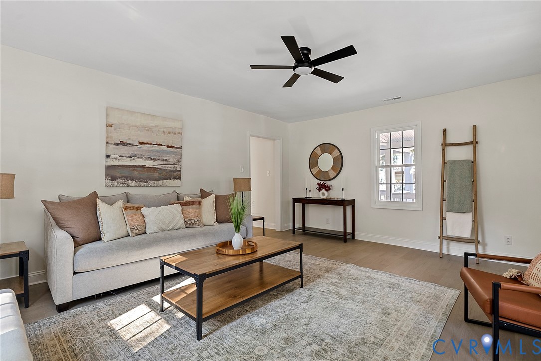 3601 Decatur Street Richmond, VA 23224 - Photo 10 of 35 Living area featuring wood finished floors and cei