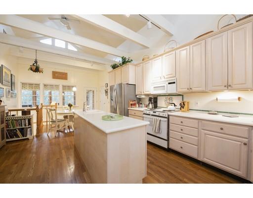 29 Sagamore Road Newton, MA 02461 - Photo 6 of 13 a kitchen with stainless steel appliances sink stove top oven and cabinets