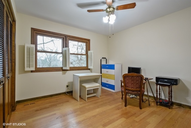 100 Ela Road Inverness, IL 60067 - Photo 14 of 25 a view of a workspace with furniture and a window