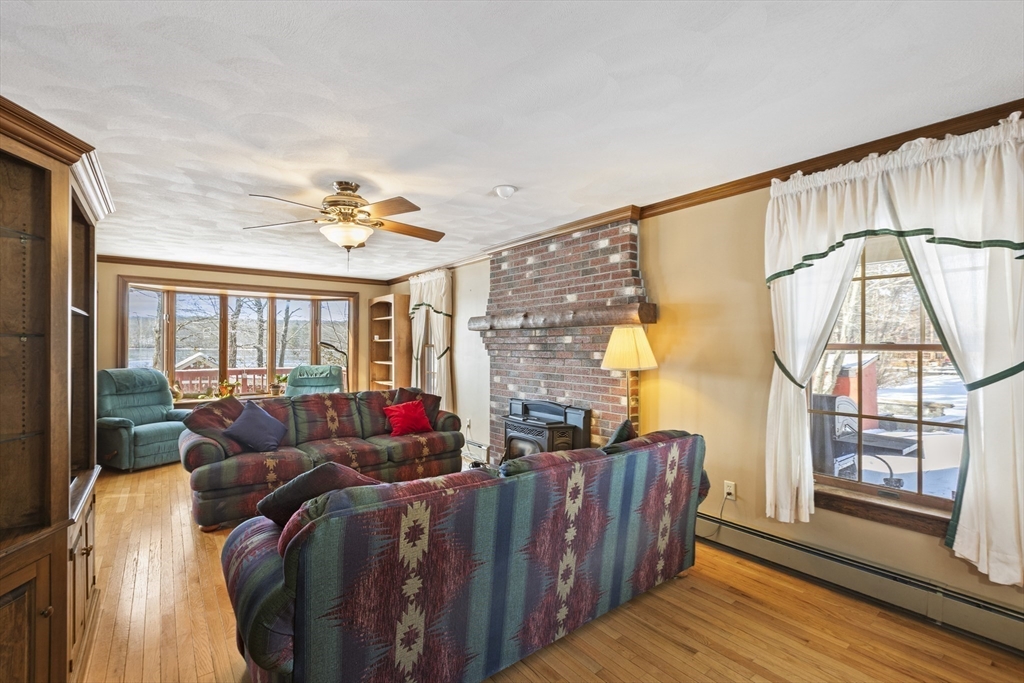 162 South Shore Road Burrillville, RI 02859 - Photo 11 of 39 a living room with furniture and a window